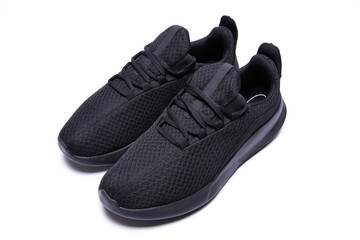 athletic lightweight black sneakers insulated on a white background isolate
