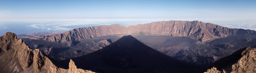 Fototapeta na wymiar traingular shadow of Pico do Fogo (2829m) in the caldera after sunrise