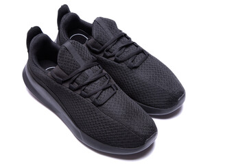 athletic lightweight black sneakers insulated on a white background isolate