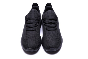 athletic lightweight black sneakers insulated on a white background isolate