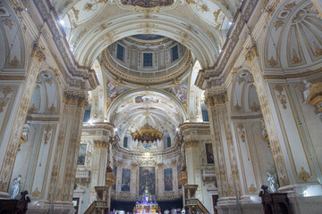 Fototapeta na wymiar Columns with dome inside of Sant'Alessandro Cathedral in Upper Town Citta Alta in Bergamo