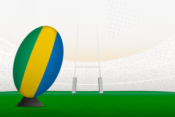 Gabon national team rugby ball on rugby stadium and goal posts, preparing for a penalty or free kick.