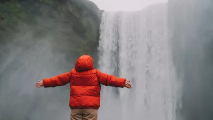 Fotobehang Kust Girl And Skogafoss In Iceland  © george