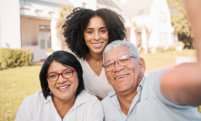 Family, parents and adult daughter in selfie, happy outdoor and relax on lawn, bonding and love with memory. Senior man, women and smile in picture, social media post and care with trust in garden