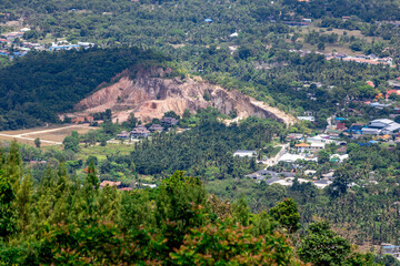Fototapeta premium panoramic background of high mountain scenery, overlooking the atmosphere of the sea, trees and wind blowing in a cool blur, spontaneous beauty