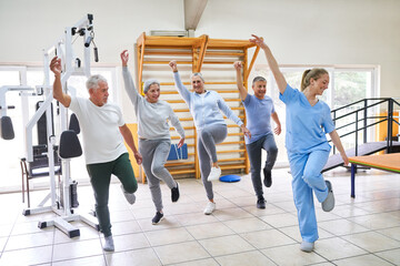 Group of senior people dancing and working out in fitness class