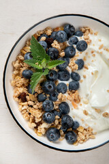 Obraz na płótnie Canvas Healthy breakfast, cereal with berries and yogurt.