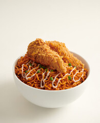 Korean instant noodles with fried chicken or chicken ramyeon and mayonnaise sauce - Korean food style