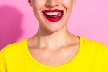 Close up cropped portrait of positive person beaming smile tongue lick white clean teeth isolated on pink color background