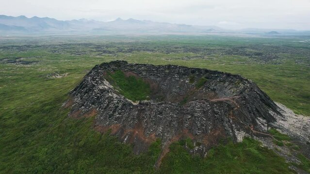 volcano crater flyover and topview, aerial shot volcanic iceland landscape, icelandic outdoor travel trails hiking destination great outdoor geology hotspot landmark. spectaculair and scenic cinematic