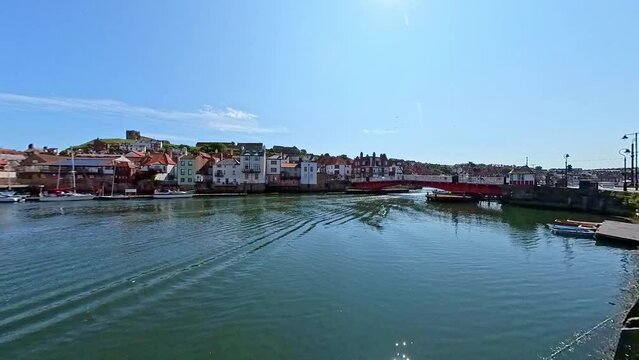 The River Esk in Whitby harbour on the North Yorkshire Coast. Captured on a bright and sunny summer day