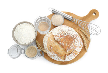 Freshly baked bread, sourdough and other ingredients on white background, top view