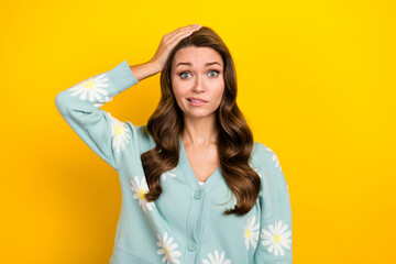 Photo of young funny clueless nervous lady wear turquoise cardigan hand head problems hesitate...