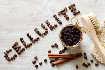 Natural coffee scrub and massage brush, skin care concept anti-cellulite