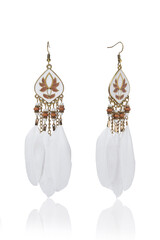Subject shot. Long graceful boho style earrings decorated with thin clusters of colorful beads and feathers.  The earrings are isolated on a white background.
