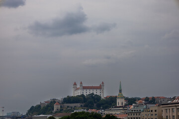Obraz premium View of the Bratislava Castle. Castle in the capital of Slovakia, Bratislava. The photo conveys all the magnificence of the castle and its beauty