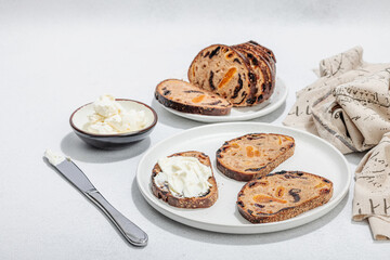 Sweet bread with raisins, dried apricots, dates, figs. Healthy ingredient for sandwiches, breakfast