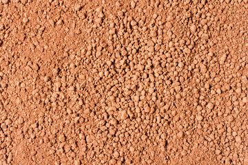 Cocoa powder texture for background, top view, flat lay.