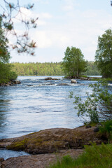 Mountain, northern rivers with rocks and a waterfall. Republic of Karelia