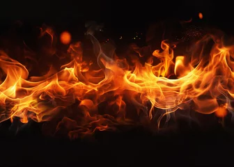 Wall murals Fire Fire embers particles over black background. Fire sparks background. Abstract dark glitter fire particles lights.