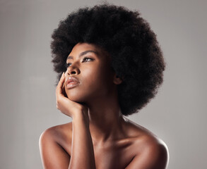 Skin, face and natural beauty, black woman thinking, cosmetics and glow isolated on studio...
