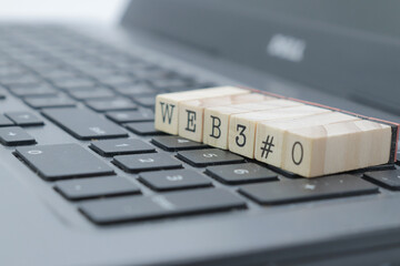 web 3.0 written on wooden cubes on a computer
