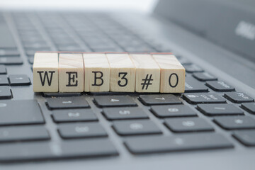 web 3.0 written on wooden cubes on a computer