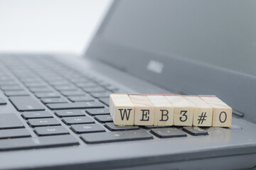 web 3.0 written on wooden cubes on a computer