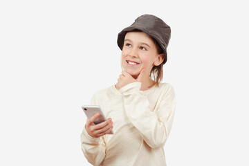 Smart kid holding a mobile phone. Technology, lifestyle and people concept.