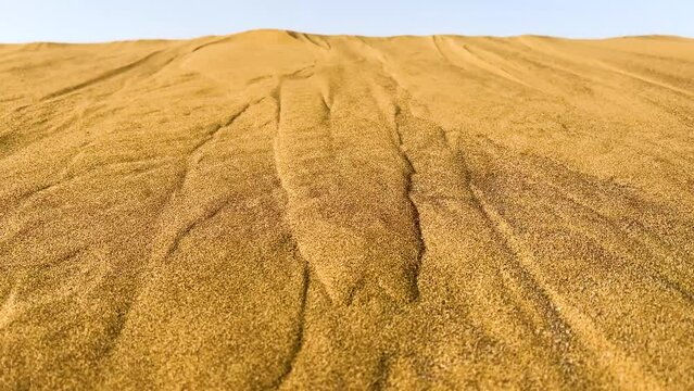 View of the magnificent sand dunes with small mountains from the top at day time. Diffused natural beautiful lighting of sandy hills. desert top view