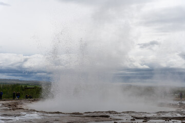 Naklejka na ściany i meble Iceland - 06.30.2023: Strokkur geyser erupting