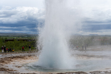 Naklejka na ściany i meble Iceland - 06.30.2023: Strokkur geyser erupting