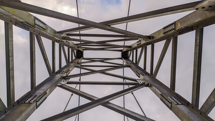 Fototapeta na wymiar Steel pole structure on a suspension bridge