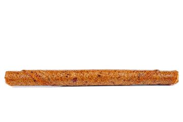 Fruit leather apricot roll isolated on a white background. Tasty fruit pastille marshmallow.