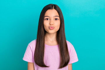 Fototapeta premium Photo of flirty sweet small kid wear pink t-shirt lips pouted sending kiss isolated turquoise color background