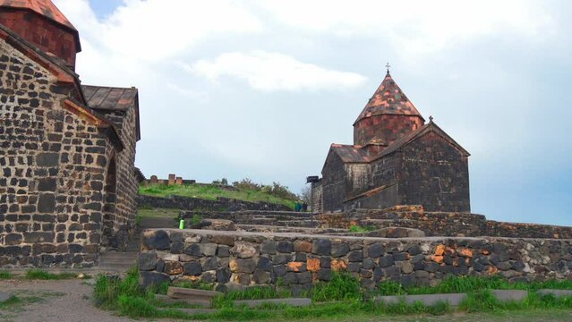 Scenic view of old Sevanavank church in Sevan, Armenia on sunny blue sky day. Sevanavank monastery complex on peninsula on northwestern shore of Lake Sevan in Armenia