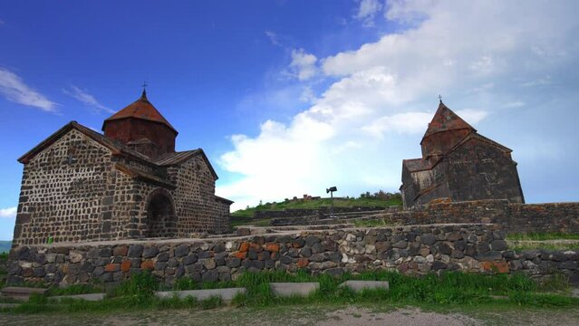 Scenic view of old Sevanavank church in Sevan, Armenia on sunny blue sky day. Sevanavank monastery complex on peninsula on northwestern shore of Lake Sevan in Armenia