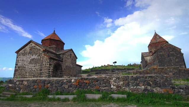 Scenic view of old Sevanavank church in Sevan, Armenia on sunny blue sky day. Sevanavank monastery complex on peninsula on northwestern shore of Lake Sevan in Armenia