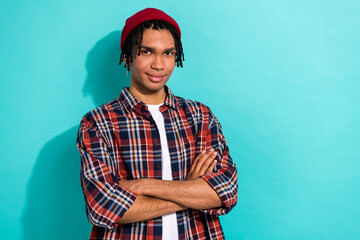 Fototapeta premium Photo portrait of attractive young male crossed arms shopping promo model wear trendy plaid garment isolated on aquamarine color background