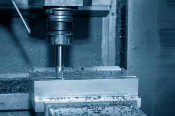 The CNC milling machine rough cutting the injection mold parts by indexable tools.