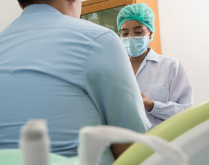 Dentists hold models while explains to the patient in dental clinics, dental and oral treatments and treatments, patients undergo dental care consultations. Dental demonstration