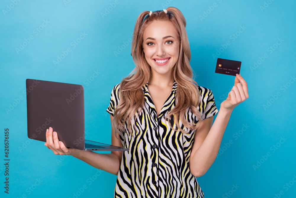 Sticker Photo of pretty cheerful person hold wireless netbook plastic debit card eshopping online order isolated on blue color background