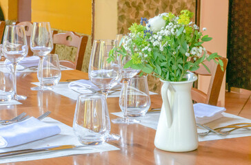 Green flowers on the restaurant table