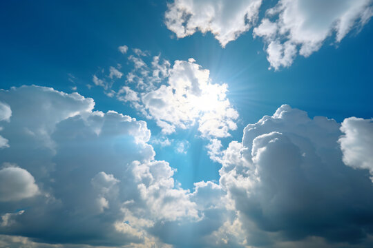 Blue sky with clouds and sun photography