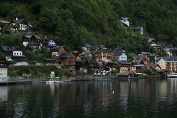 Fototapeta na wymiar Mountain-Enveloped Lakeside Hamlet in Austria