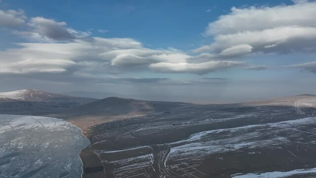 Aerial view of frozen Lake Paravani. The largest lake in Georgia at an altitude of more than 2000 meters.