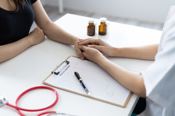 Doctor are giving advice on treatment to patients in hospital examination rooms, treating medicine diseases from specialists. Concepts of medical treatment and health consultation.