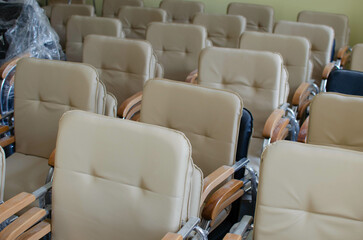 Obraz premium new chairs in stock.chairs assembled together.wholesale.