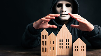 Burglar intruder thief consider dominating to stealing uninhabited houses in city in black dark...