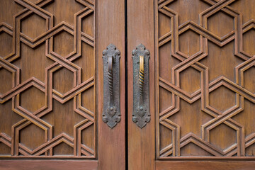 Old luxury wood door and brass handles